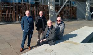 Some of the group sunning themselves before entering Parliament